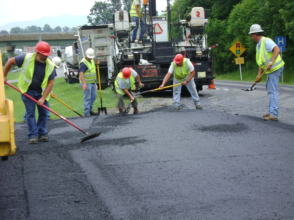 W-L paving crew working fresh asphalt